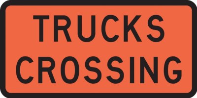 ROAD SIGN TEMPORARY TRUCKS CROSSING